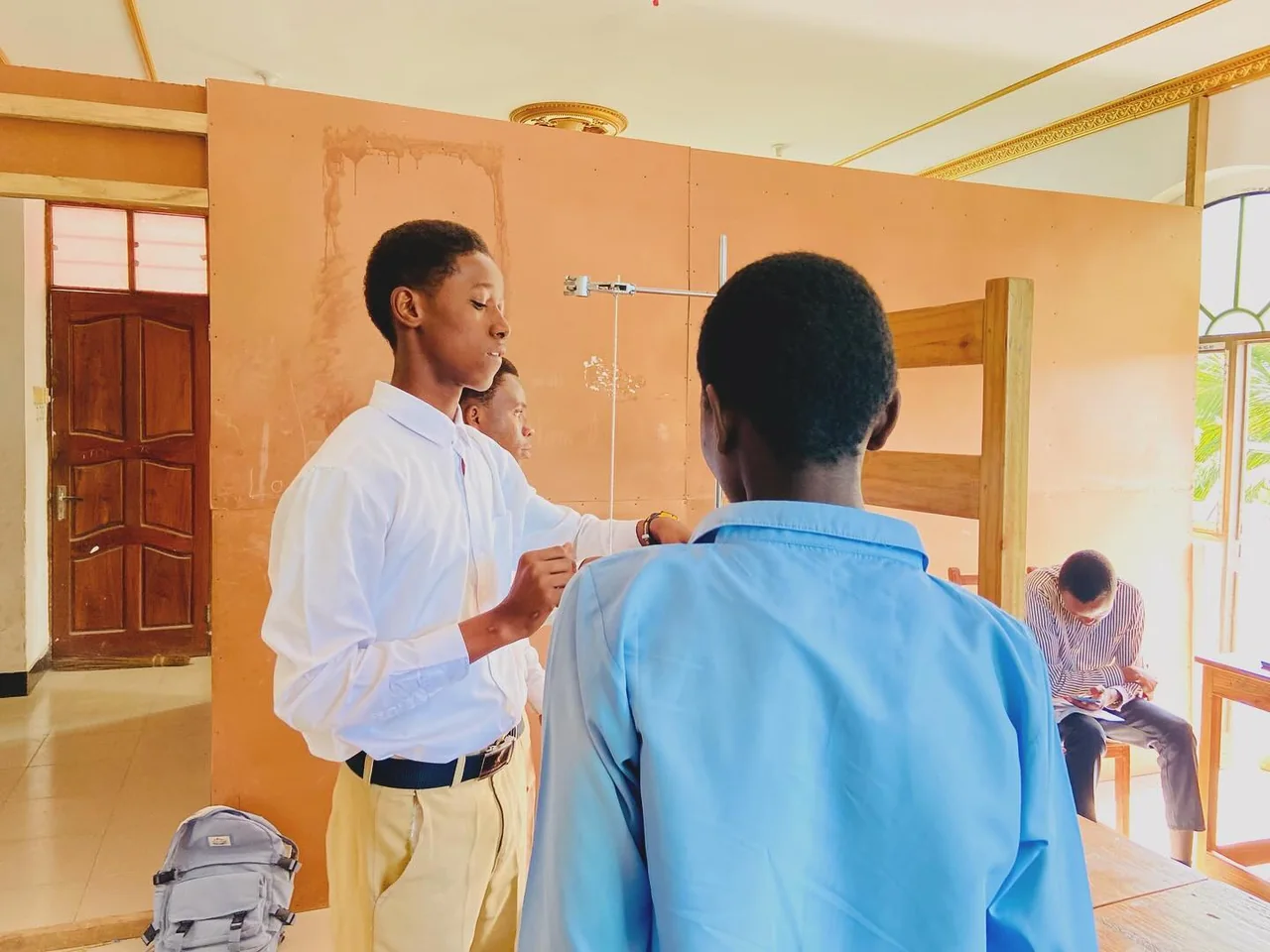 Pupils taking part in a hands-on science learning activity